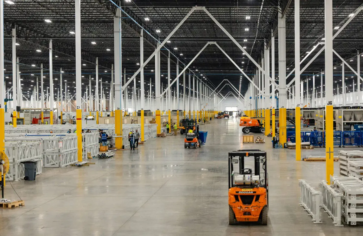 The floor of an Integra manufacturing facility, with equipment staged along the aisles